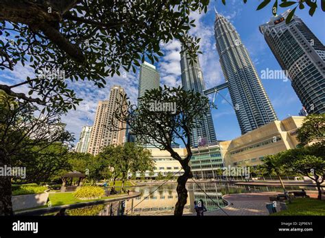 Beyond Petronas: A Journey Through Malaysian Urban Landscapes -  Echoes of Concrete and Whispers of Tradition